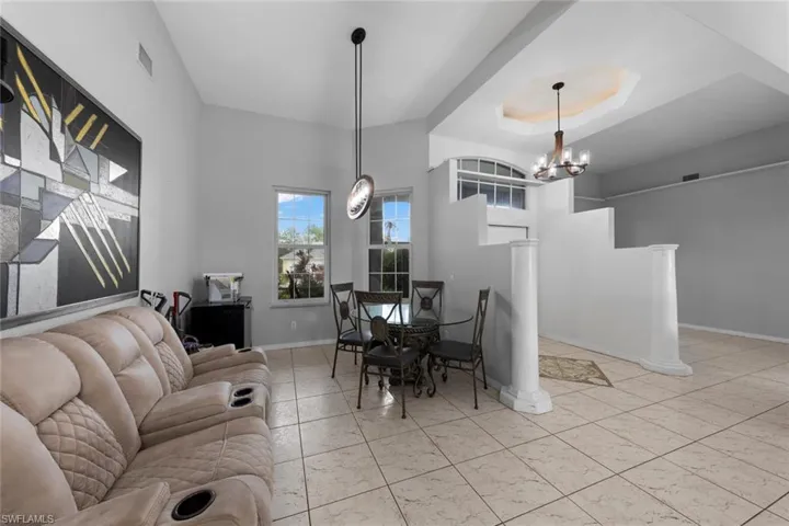Dining area with an inviting chandelier