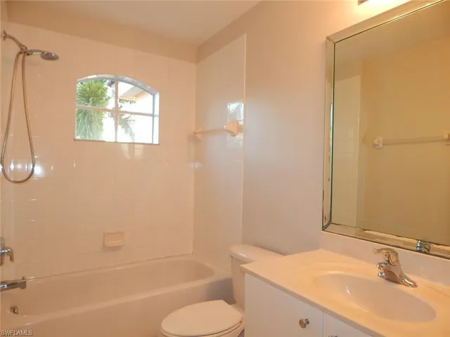 Guest bathroom featuring vanity and shower / bathtub combination