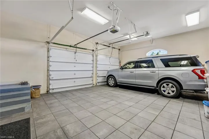 The home’s second oversized garage impresses with tile floors, dual storage zones, and abundant room for all your storage essentials.