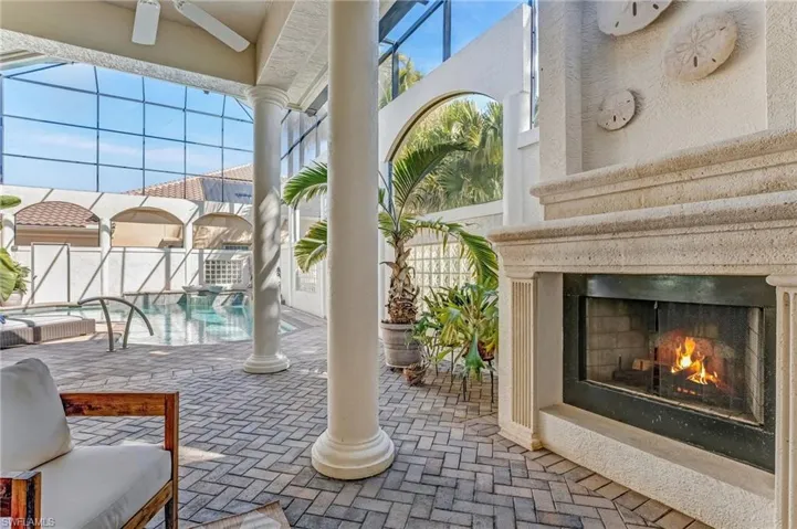 Your wood-burning fireplace is just outside the primary suite on your lanai.