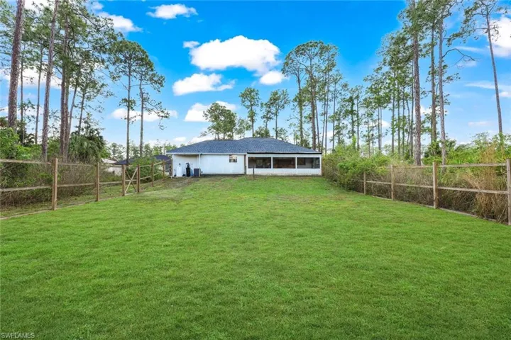 Over 1 acer of land, Full fenced back yard