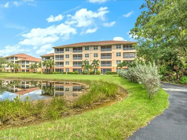View of property featuring a water view