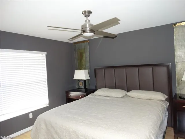 Bedroom featuring a ceiling fan
