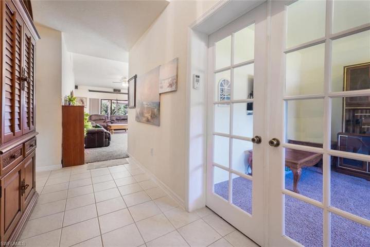 Entryway with den on right