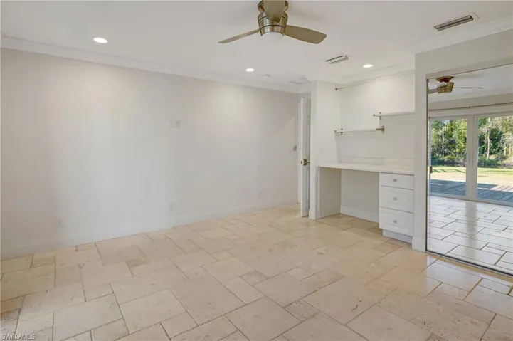 Same bedroom with built in desk & shelves