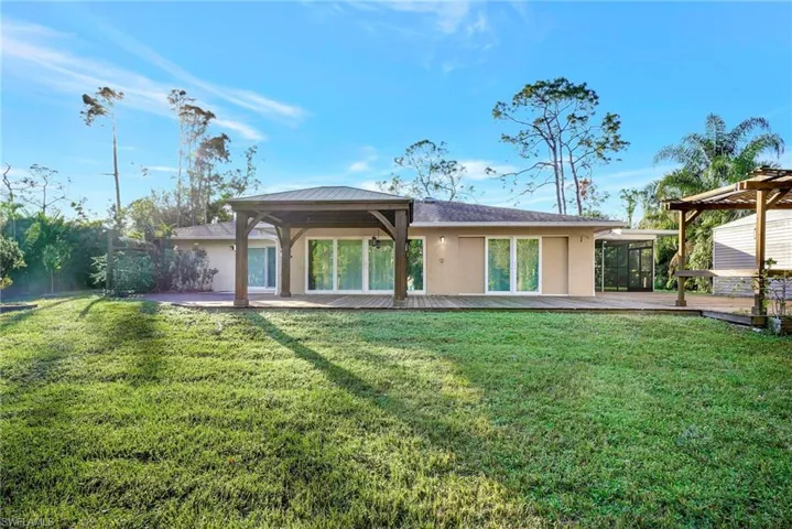 Back of house with plenty of room for a pool!
