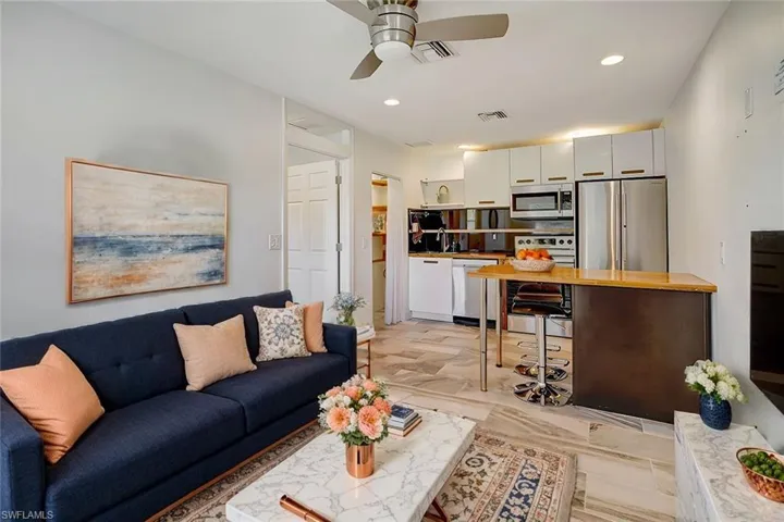Mother-in-Law Suite:  Living room & kitchen.  Virtual Stage of furniture