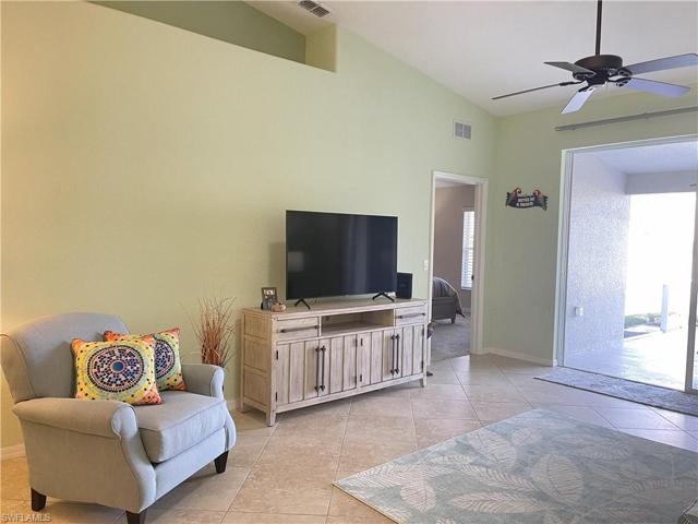 Large TV & chair in living room