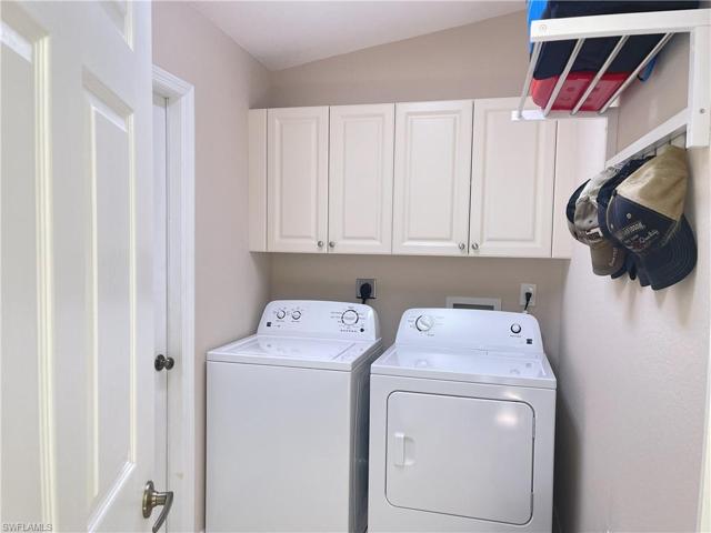 Laundry room between garage and kitchen