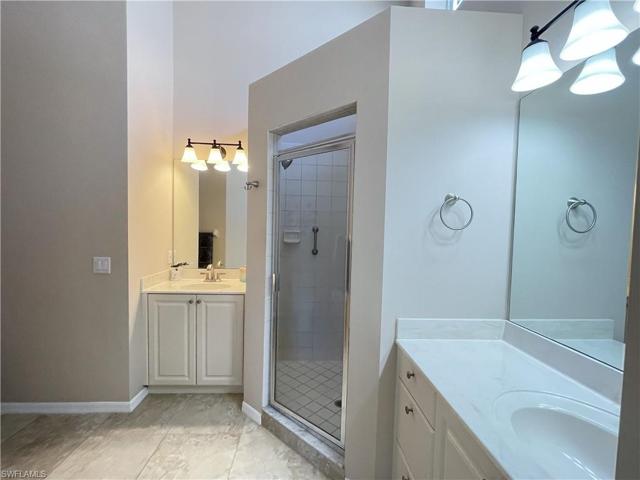 Master bathroom has dual sinks and nice size shower