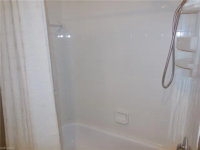 Bathroom with shower / tub combo