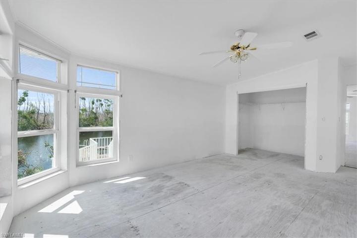 Master bedroom looking at closet standing by bathroom
