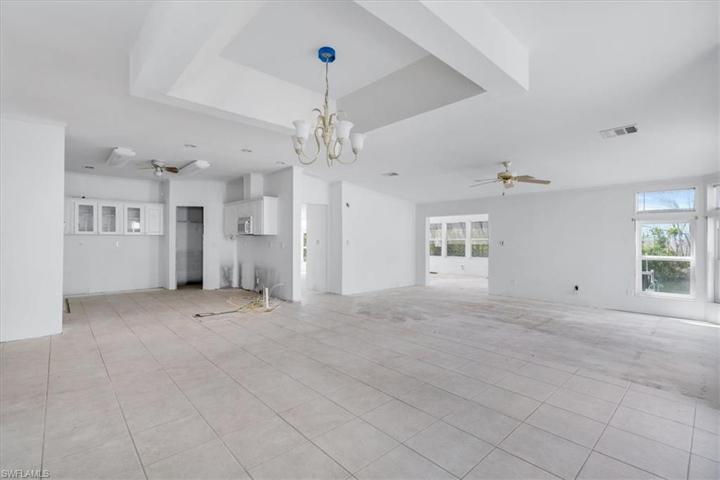 This is the dining area looking over the living room, kitchen and Florida room