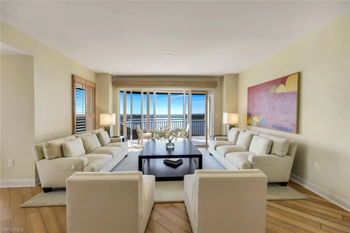 Bright, inviting living space with waterfront views.