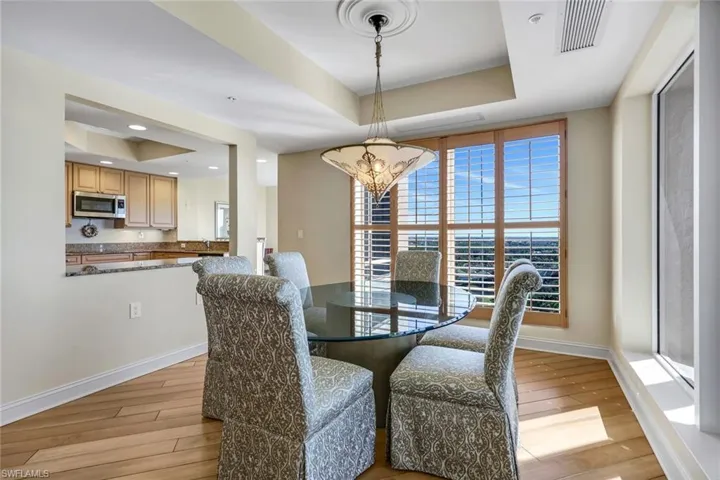 Airy dining room with easy sightlines into the kitchen, creating a seamless flow for entertaining.