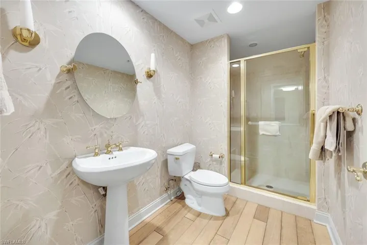 Third full bathroom with walk in shower.