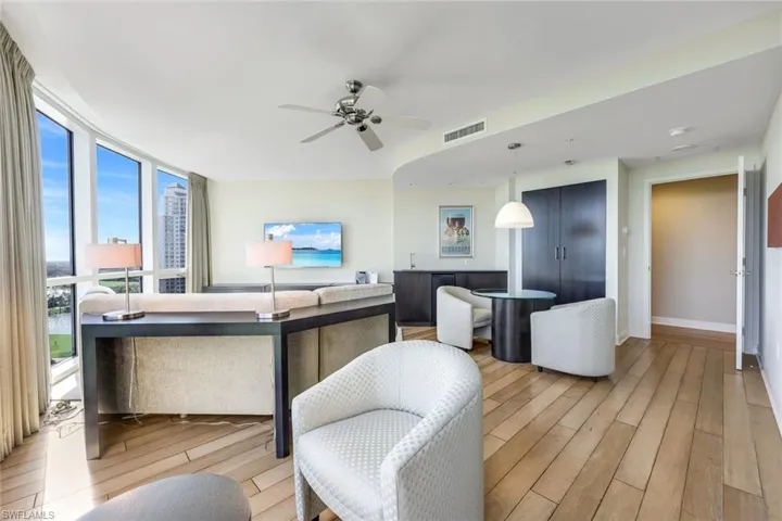 Floor-to-ceiling windows, wood flooring, open yet intimate spaces - this home is absolutely lovely!