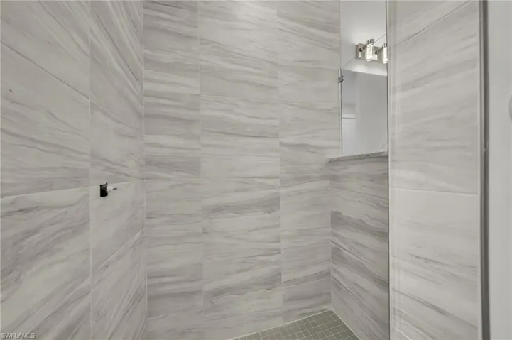 Bathroom with a tile shower