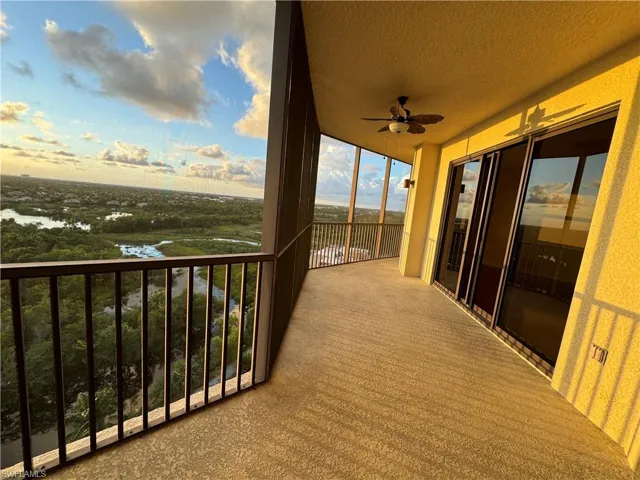 Balcony featuring ceiling fan