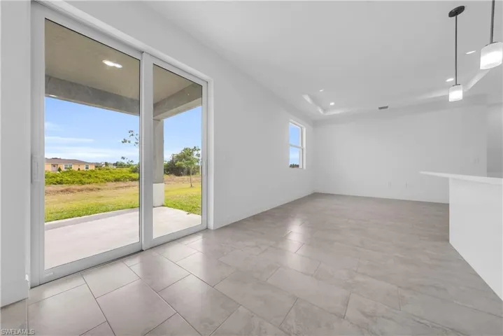 Empty room featuring recessed lighting