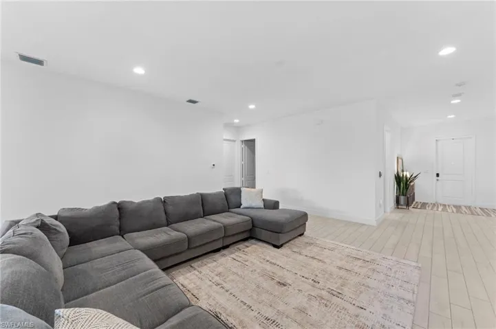 Living room featuring light hardwood / wood-style flooring