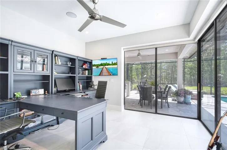 Den in back of open with zero degree sliders that open to lanai