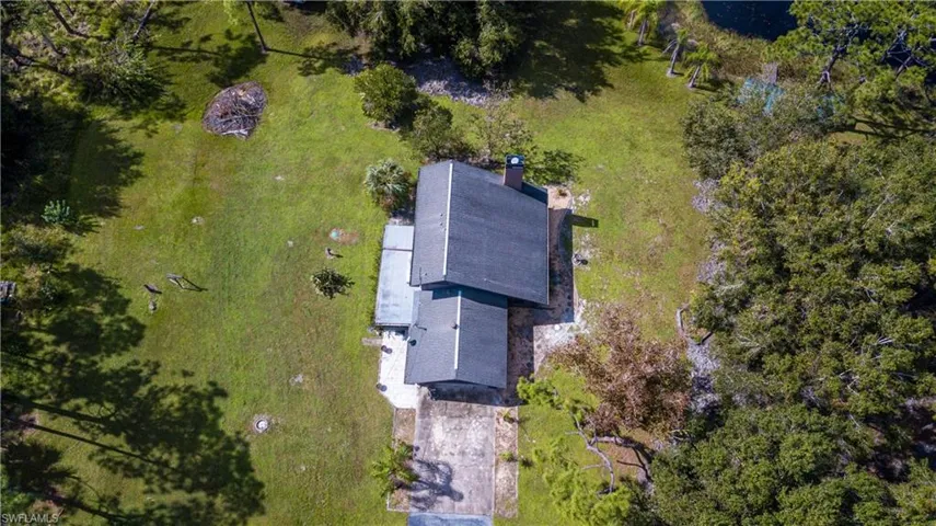 Aerial View Of 11590 Fox Hill Rd. Home Is Located In The Center Of A 5 Acre Parcel. The Adjacent 5 Acre Tract Is Also AVAILABLE FOR SALE. These 2 Lovely Properties Meet In The Middle With A .75/Acre Private Lake.
