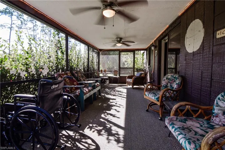 Large Screened Lanai With Over 250 Square Foot Of Living Space And Screen Doors On Either End For Easy Access To The Forest And The Private Lake.