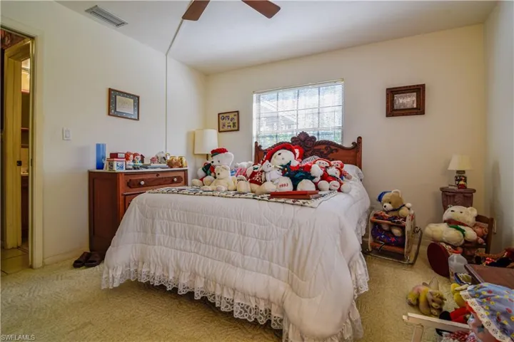1st Floor Bedroom Tucked In At The Rear Of The Home For Privacy. 1st Floor Bathroom Conveniently Located Adjacent To The Bedroom Entrance. Large Windows Overlooking Woods And Views Of The Private Lake.