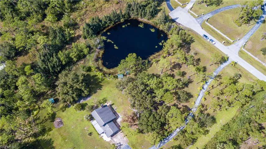 Aerial View Of 11590 Fox Hill Rd. Home Is Located In The Center Of A 5 Acre Parcel. The Adjacent 5 Acre Tract Is Also AVAILABLE FOR SALE. These 2 Lovely Properties Meet In The Middle With A .75/Acre Private Lake.