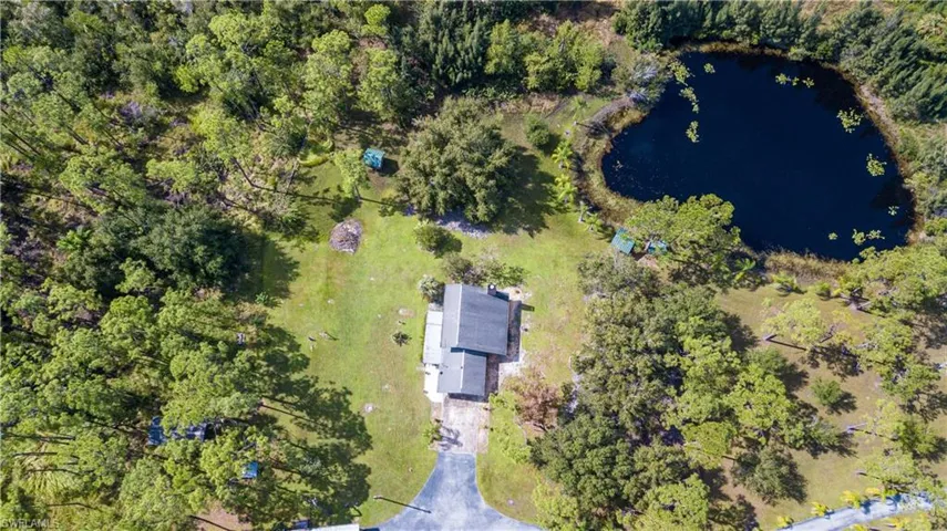 Aerial View Of 11590 Fox Hill Rd. Home Is Located In The Center Of A 5 Acre Parcel. The Adjacent 5 Acre Tract Is Also AVAILABLE FOR SALE. These 2 Lovely Properties Meet In The Middle With A .75/Acre Private Lake.