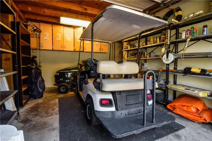 At The End Of The Winding Palm Tree Lined Driveway, Adjacent To The Home And A Circular Driveway There Is A Detached Garage With 3 Overhead Garage Doors Providing Room For Up To 4 Cars. Additionally, There Are Some 2nd Floor Storage Options Within This Versatile Secondary Building.