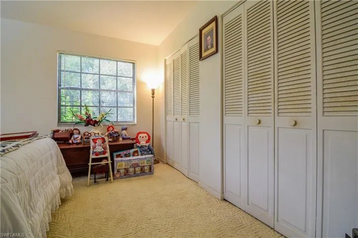 1st Floor Bedroom Tucked In At The Rear Of The Home For Privacy. 1st Floor Bathroom Conveniently Located Adjacent To The Bedroom Entrance. Large Windows Overlooking Woods And Views Of The Private Lake.