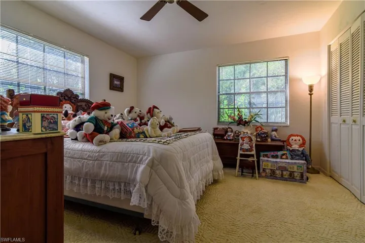 1st Floor Bedroom Tucked In At The Rear Of The Home For Privacy. 1st Floor Bathroom Conveniently Located Adjacent To The Bedroom Entrance. Large Windows Overlooking Woods And Views Of The Private Lake.