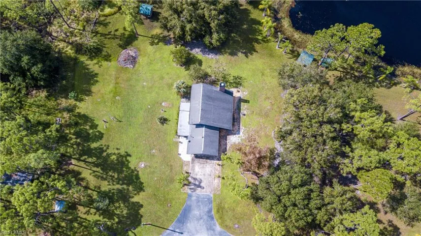Aerial View Of 11590 Fox Hill Rd. Home Is Located In The Center Of A 5 Acre Parcel. The Adjacent 5 Acre Tract Is Also AVAILABLE FOR SALE. These 2 Lovely Properties Meet In The Middle With A .75/Acre Private Lake.