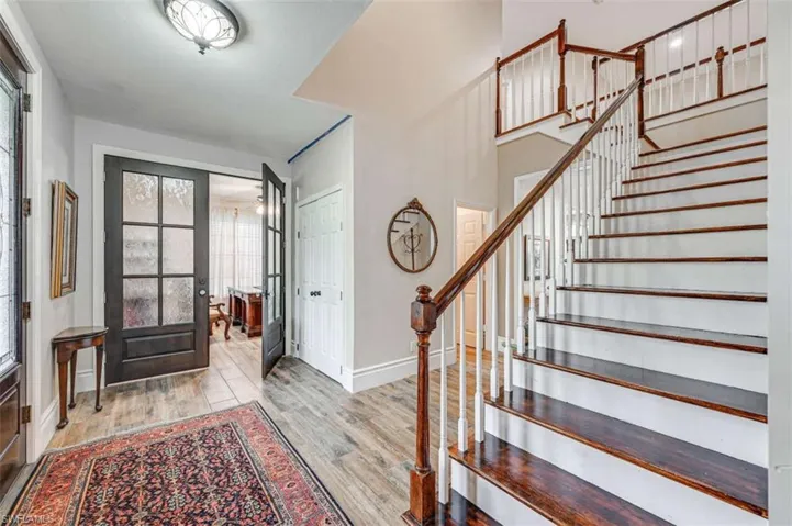Entrance foyer featuring light wood-type flooring