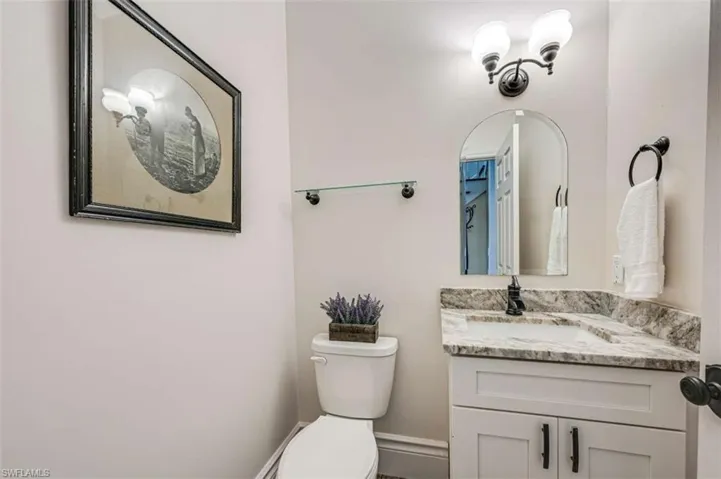 Bathroom with toilet and vanity