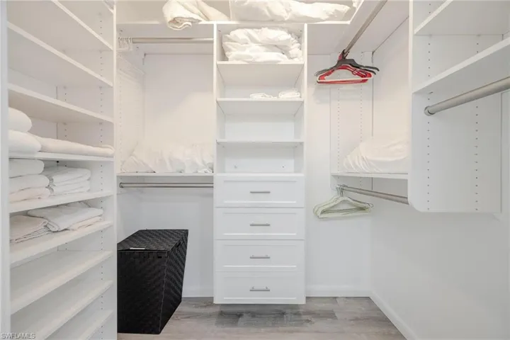 Talk about space! Check out this walk in closet!!