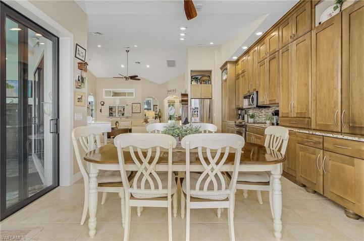 Dining Room with views of the pool and canal.