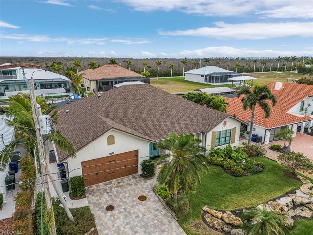 Aerial of home in a quiet neighborhood.