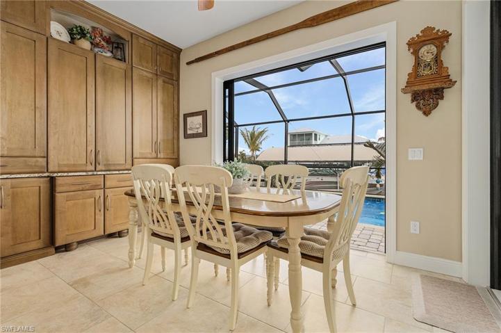 Lovely views from the dining area, along with 2 sets of sliders to the pool and lanai.