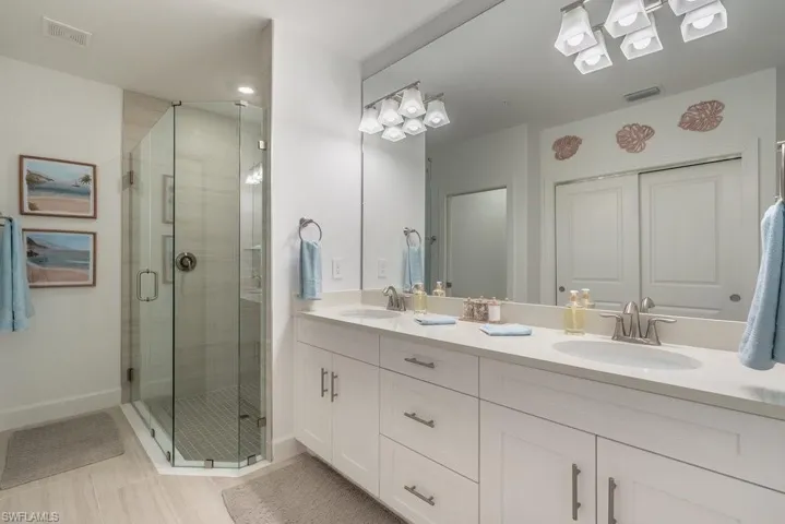 Primary Bath with walk in shower and double vanity