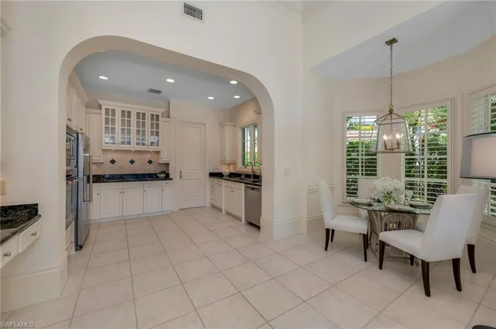 A unique design to this residence, is that is has a breakfast nook between the kitchen and family room.  Coffee and croissants, anyone?