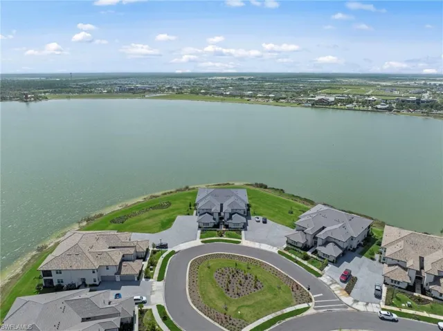 Aerial view of residential area with a nearby body of water