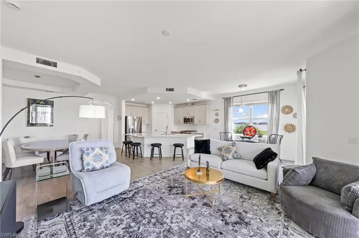 Living area featuring light wood-type flooring