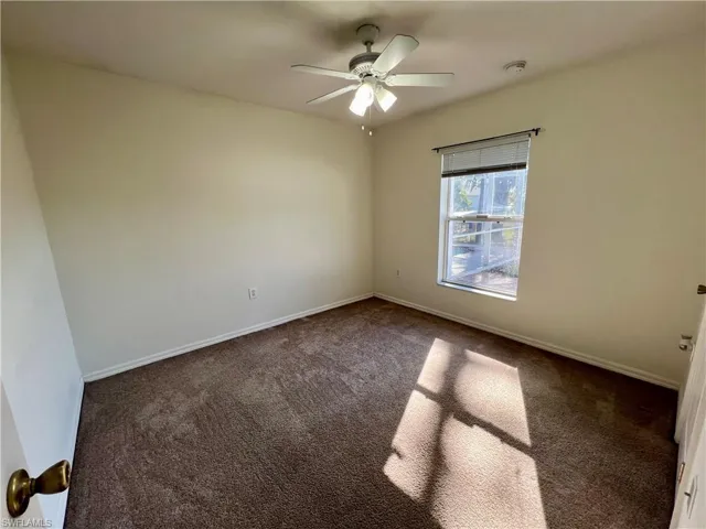 Guest bedroom with ceiling fan