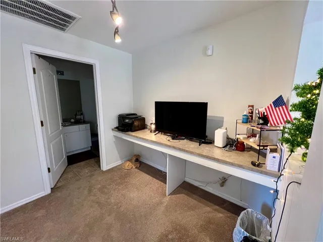 Home office with built in desk