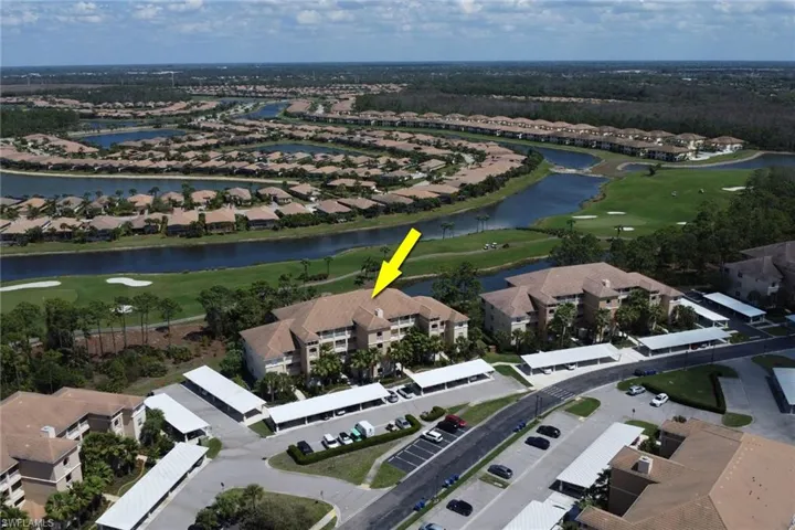 Aerial overview of property's location with a golf course, a large body of water, and nearby suburban area
