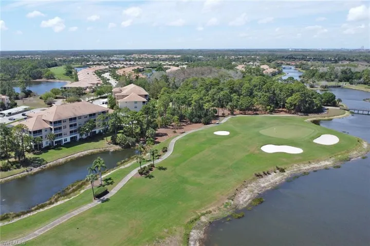 Aerial view of a local golf course and a large body of water