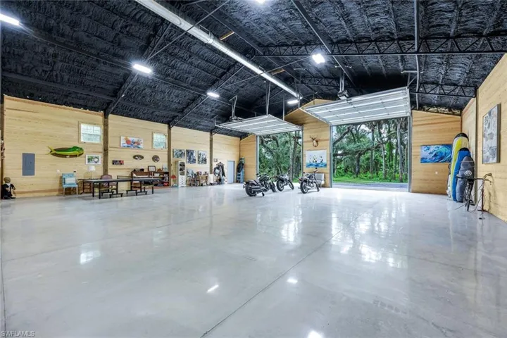 LOOKING EAST TOWARDS GARAGE DOORS